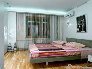 Нитяные шторы в интерьере спальни